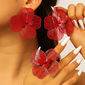 Oversized red hollow-out flower jewelry set with floral earrings and matching ring