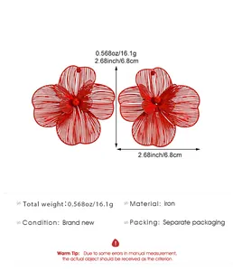 Detailed view of red oversized hollow flower earrings with measurement specifications