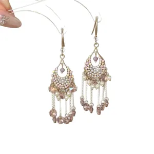 Elegante Tassel-Ohrhänger im Palaststil mit Perlen und champagnerfarbenen Glasperlen.