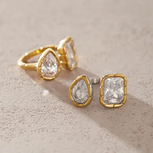 Detail shot of stainless steel rings featuring ribbed bezel and large zircon stones