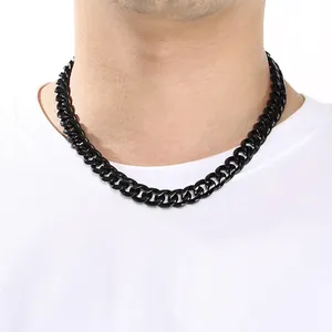 Premium black stainless steel Cuban link chain necklace shown on a male model's neck