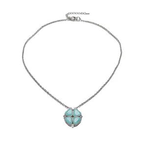 Silver-tone necklace with light blue four-leaf clover heart-shaped pendant