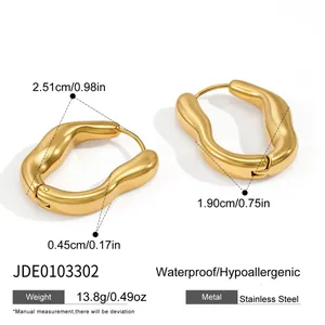Detailed view of gold irregular stainless steel hoop earrings with size measurements