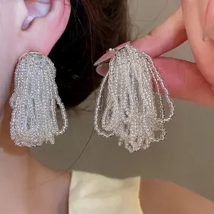 Exquisite crystal beaded tassel earrings with a shimmering oversized waterfall design