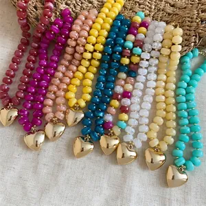 Collane di perle acriliche colorate con eleganti ciondoli a forma di cuore d'oro
