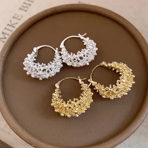Elegant French hollow basket hoop earrings with textured gold and silver metallic finish