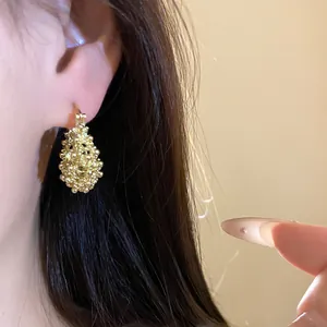 French vintage gold openwork flower basket hoop earrings for elegant women's jewelry