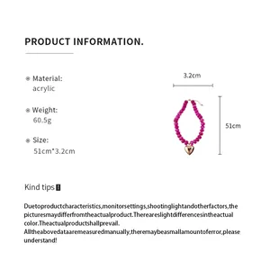 Macro view showing resin beads and heart pendant with specifications for the necklace