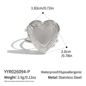 Detail view of heart locket ring with dimensions 1.83x2.0cm and weight 3.5g.