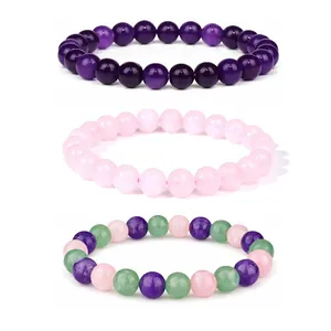 Set di tre bracciali elastici con perline viola, rosa e pietre preziose miste levigate
