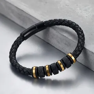Close-up of men's braided leather bracelet with knurled steel beads and magnetic clasp
