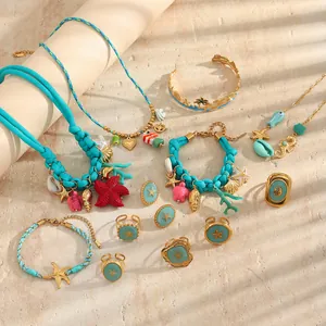Ocean-themed jewelry set featuring blue braided rope and gold-plated starfish charms.