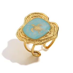Elegant 18K gold plated stainless steel sea turtle ring with light blue enamel finish