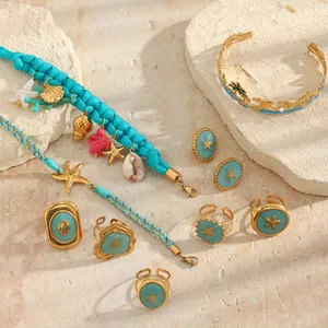 Detailed collection of ocean-themed stainless steel jewelry with starfish and shell charms