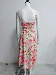 Pink floral print maxi dress featuring a sexy lace-up corset back on mannequin