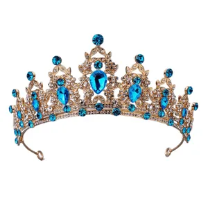 Vintage gouden bruidskroon met blauwe kristallen en heldere strass steentjes