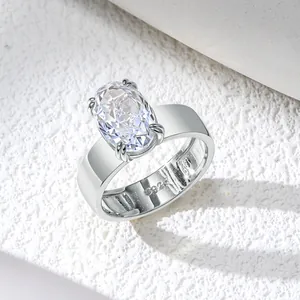 Macro view of a minimalist S925 sterling silver ring featuring a large ice-flower oval stone.