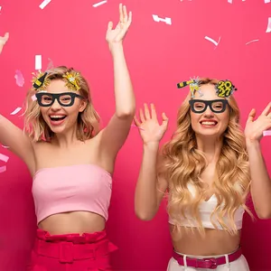 Festive 2027 New Year party photo booth prop glasses in black and gold glitters
