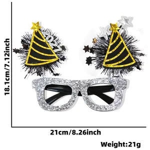 Festive New Year party glasses featuring 2027 star and hat decorations in silver