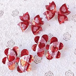 Rote Glitzer-Herzschleifen-Haarspangen für das Valentinstag-Haarstyling von Kindern