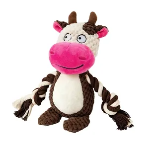 Squeaky plush cow toy for dogs featuring durable cotton rope limbs for interactive tug play