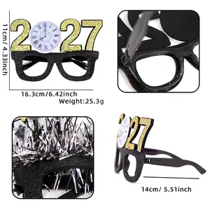 Detailed views of 2027 New Year party glasses showing glitter finish and measurements