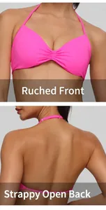 Detailed view of neon pink halter sports bra with ruched front and open back design
