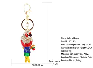 Detailed view of colorful parrot keychain with rhinestone inlay and size dimensions