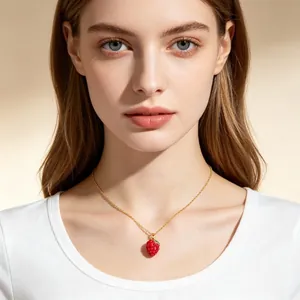 Charming sweet red strawberry fruit pendant necklace on a delicate gold chain for women