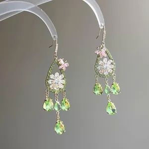 Vintage floral drop earrings with green teardrop crystals and pink butterfly accent