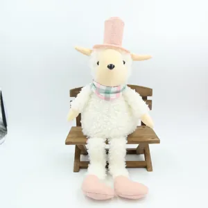 Vintage curly long-legged sheep plush toy with pink top hat sitting on a wooden bench.