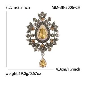Vintage silver brooch with amber water-drop glass pendant and crystal accents