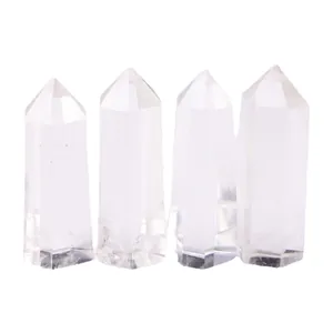 Set of four natural clear quartz hexagonal crystal pillars for home decor