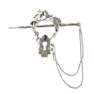 Vintage silver alloy hair stick with intricate bird and keyhole design detail view