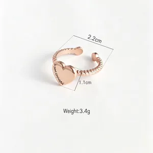 Elegant rose gold heart-shaped stainless steel ring featuring I am enough engraving.