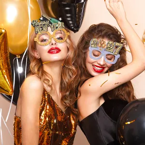 Two models wearing 2027 and Happy New Year glitter party glasses in a celebration scene.