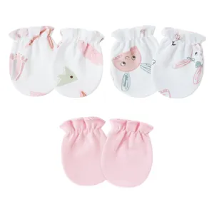 Detailed view of three pairs of soft cotton baby anti-scratch mittens in pink and prints