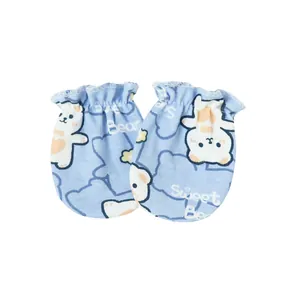 Close-up of soft baby anti-scratch mittens with cute bear patterns and elastic wrist
