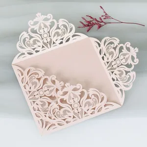 Elegant peach laser-cut lace wedding invitation card cover for parties and weddings.