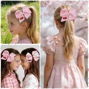 Detail showing children wearing pink heart-patterned bow hair clips for festivals
