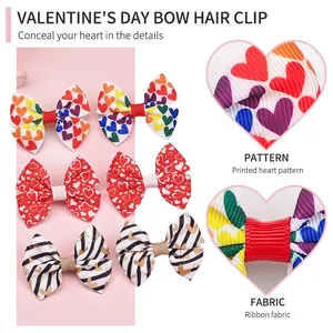 Handmade Valentine's Day ribbon hair clips featuring printed heart patterns