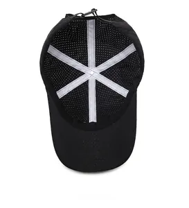 Detailed internal view showing the breathable mesh and lining of a black quick-dry baseball cap