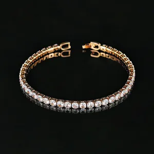 Detailed view of gold plated tennis bracelet with sparkling round white zircons