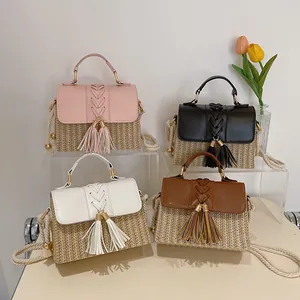 Handmade bohemian straw woven crossbody handbags with tassels in four stylish colors