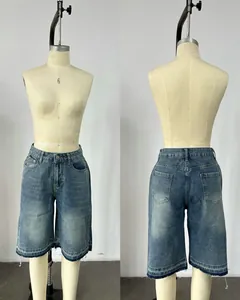 Vintage high-waisted loose denim shorts for women shown on mannequin, front and back view.