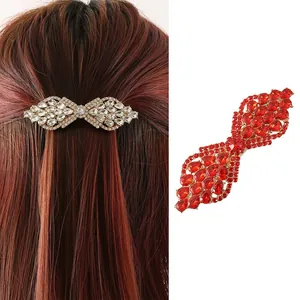 Elegant red and white rhinestone spring hair clips shown on a model for hair styling