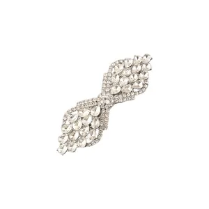 Elegant butterfly hair clip with clear teardrop crystals and silver rhinestones.