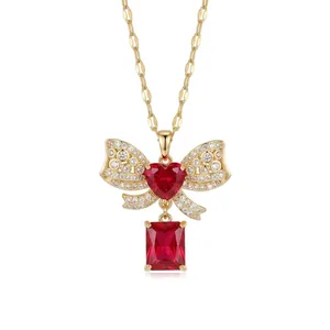 Exquisite close-up of bowknot necklace with red heart and rectangular red crystals
