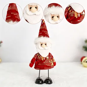 Vues détaillées d'une figurine de Père Noël en peluche avec paillettes et ressorts.