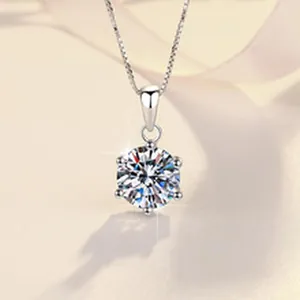 Close-up of 1 carat D color moissanite pendant with classic six-prong silver setting